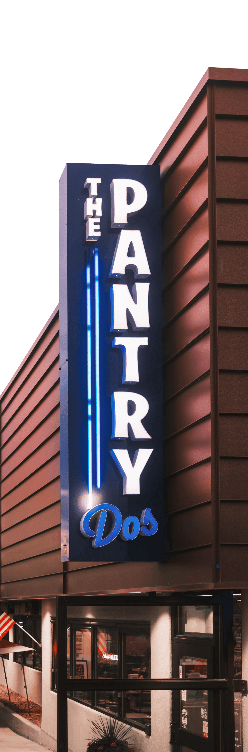 The Pantry Dos exterior at dusk